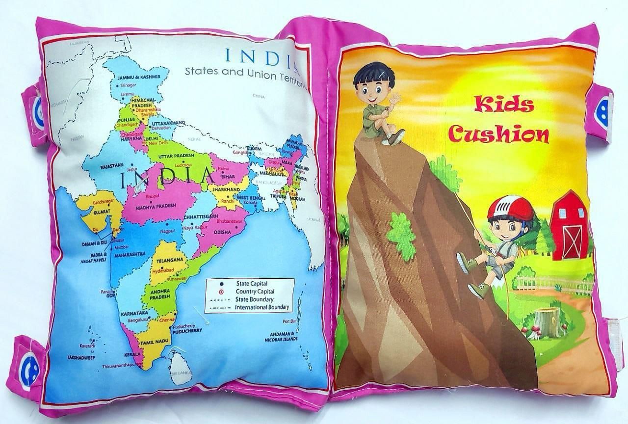 Map of India on one side and a child playing on a hillside on the other side of a cushion.