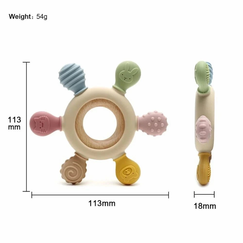 Baby teething ring with measurements and weight on a white background